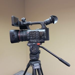 Canon XF605 video camera and tripod