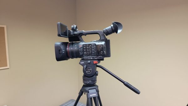 Canon XF605 video camera and tripod