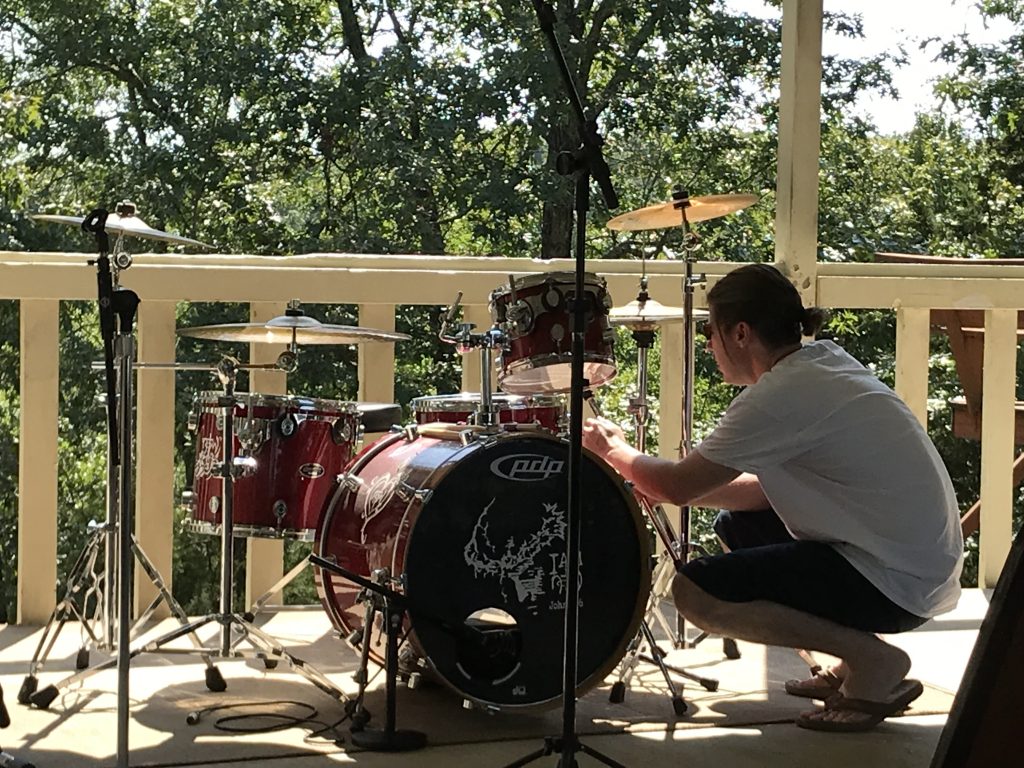 JJ setting up drums
